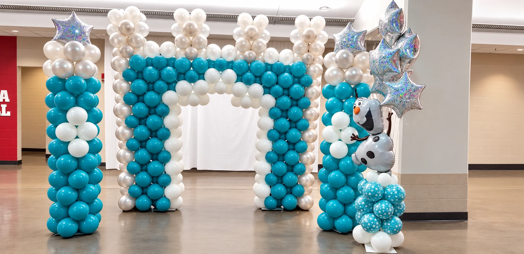 Blue, white and silver ice-princess balloon entrance