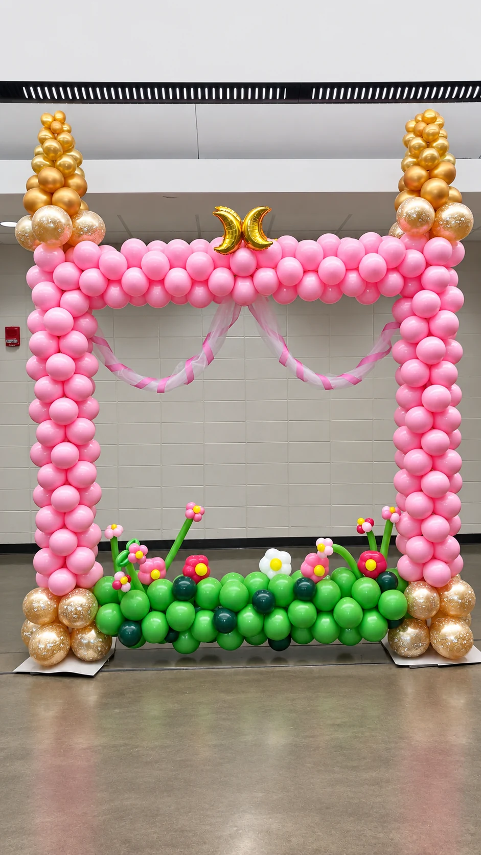 Pink candy-themed balloon photo frame with colorful balloon details