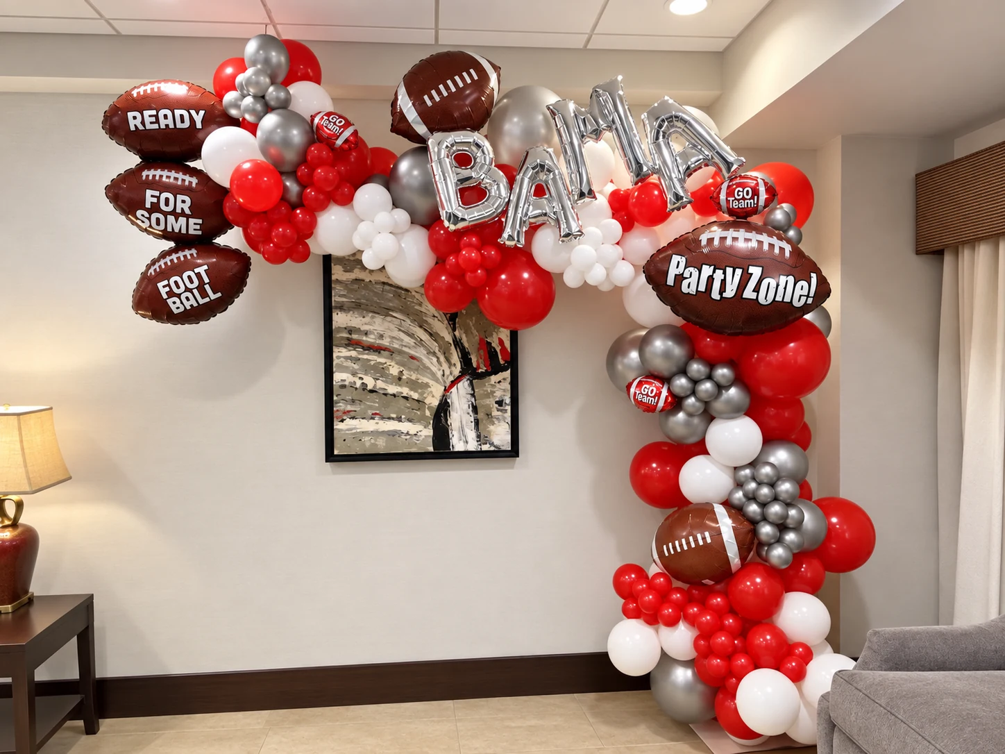 Crimson football party balloon garland with custom message balloons